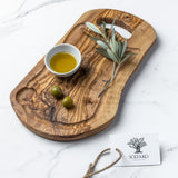 Cutting board with juice groove and handle "CARTHAGE".